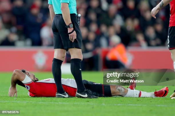 Southamptonâs Charlie Austin on the pitch injured during the Premier League match between Southampton and Huddersfield Town at St Mary's Stadium on...