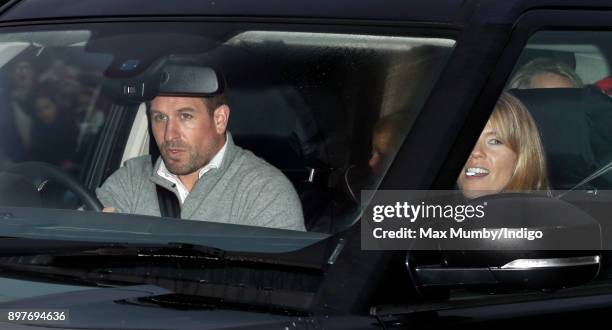 Peter Phillips and Autumn Phillips attend a Christmas lunch for members of the Royal Family hosted by Queen Elizabeth II at Buckingham Palace on...