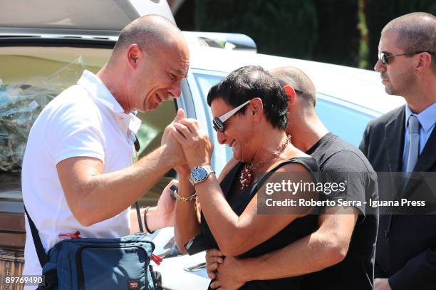 Brother of Michele Norelli gives his widow Silvia Rigamonti Norelli the wedding ring of her husband, a victim of the helicopter crash in New York, at...