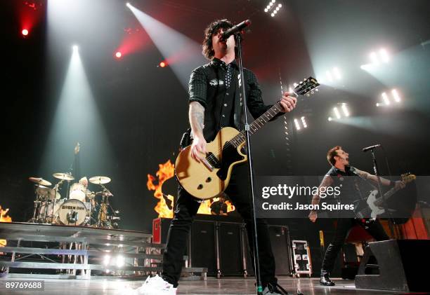 Billie Joe Armstrong, Tre Cool and Mike Dirnt of Green Day perform at the Sprint Center on August 12, 2009 in Kansas City, Missouri.