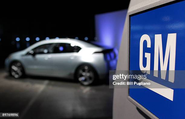 Chevrolet Volt extended-range electric vehicle sits at an event where Fritz Henderson, CEO and President of General Motors, announced that GM will...