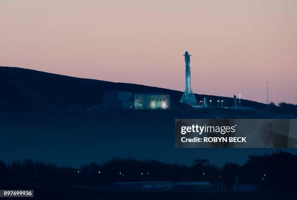 The SpaceX Falcon 9 rocket prepares to launch from the Space Launch Complex 4 at Vandenberg Air Force Base in Lompoc, California on December 22,...