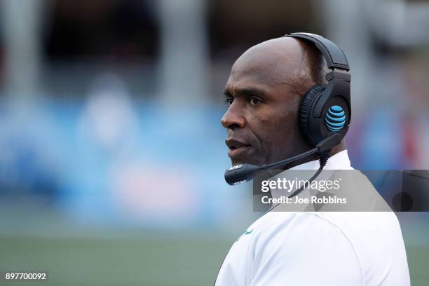 Head coach Charlie Strong of the South Florida Bulls looks on against the Texas Tech Red Raiders in the first half of the Birmingham Bowl at Legion...