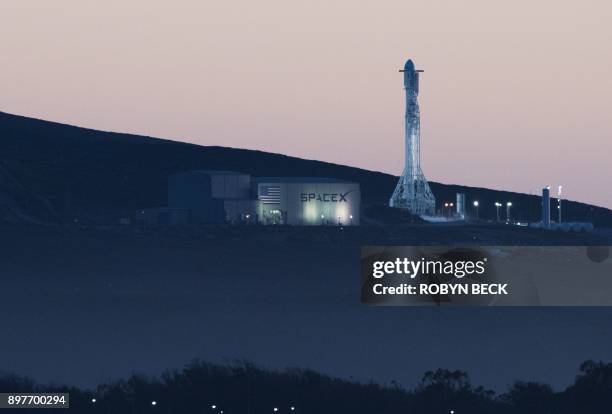 The SpaceX Falcon 9 rocket prepares to launch from the Space Launch Complex 4 at Vandenberg Air Force Base in Lompoc, California on December 22,...