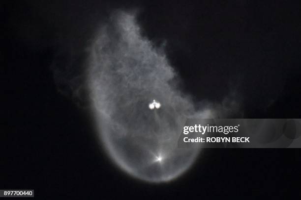 The SpaceX Falcon 9 rocket launches from the Space Launch Complex 4 at Vandenberg Air Force Base in Lompoc, California on December 22, 2017. SpaceX...