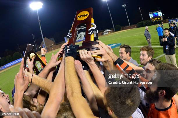 Messiah College celebrates after winning the Division III Men's Soccer Championship held at UNC Greensboro Soccer Stadium on December 2, 2017 in...