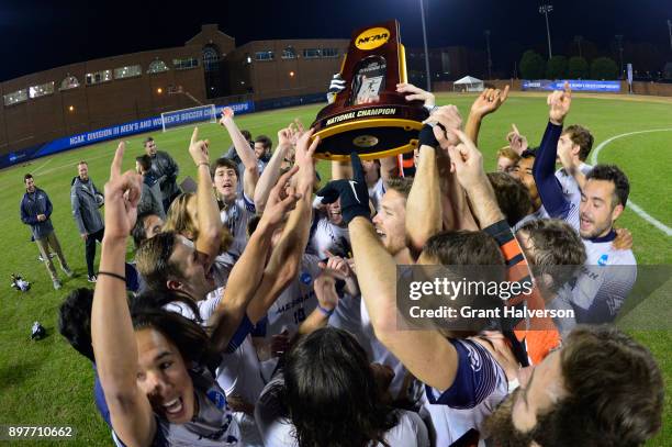 Messiah College celebrates after winning the Division III Men's Soccer Championship held at UNC Greensboro Soccer Stadium on December 2, 2017 in...