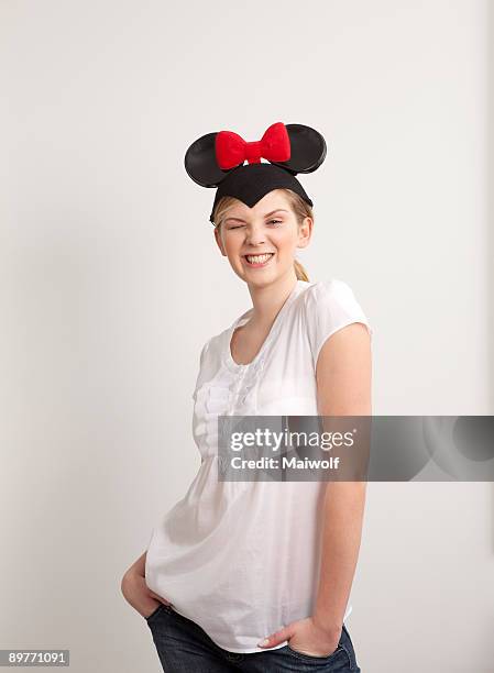 woman making a funny face - costume mouse ears stock pictures, royalty-free photos & images