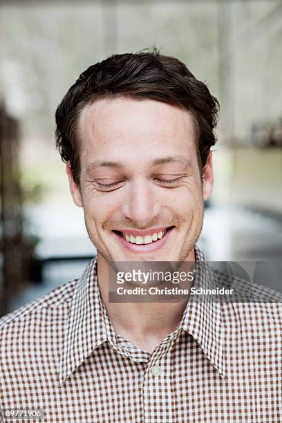 man smiling eyes closed - reserved stock pictures, royalty-free photos & images