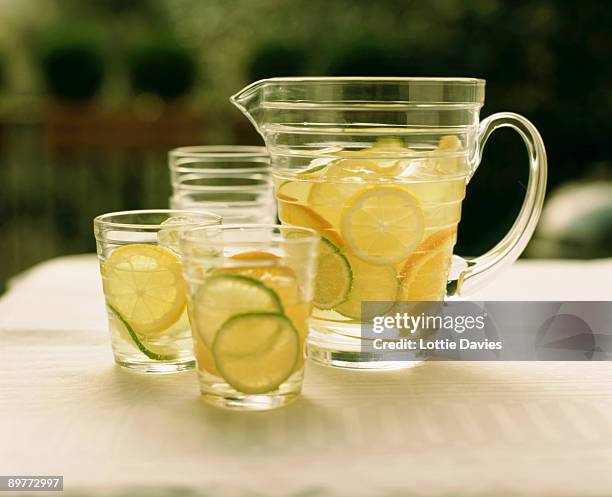 drink - lemonade jug and glasses - jug stock pictures, royalty-free photos & images