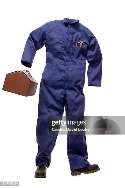 a workman's suit with tool box - coveralls stock pictures, royalty-free photos & images