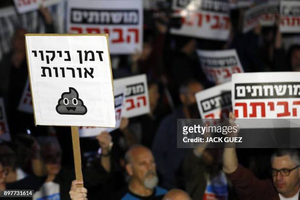 Israelis take part in a demonstration titled the "March of Shame", as they protest against Prime Minister Benjamin Netanyahu and government...