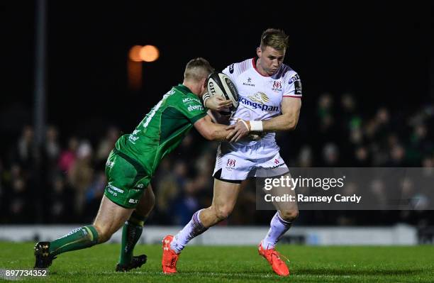 Galway , Ireland - 23 December 2017; Craig Gilroy of Ulster is tackled by Matt Healy of Connacht during the Guinness PRO14 Round 11 match between...