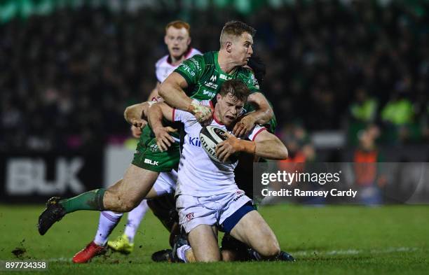 Galway , Ireland - 23 December 2017; Andrew Trimble of Ulster is tackled by Matt Healy of Connacht during the Guinness PRO14 Round 11 match between...