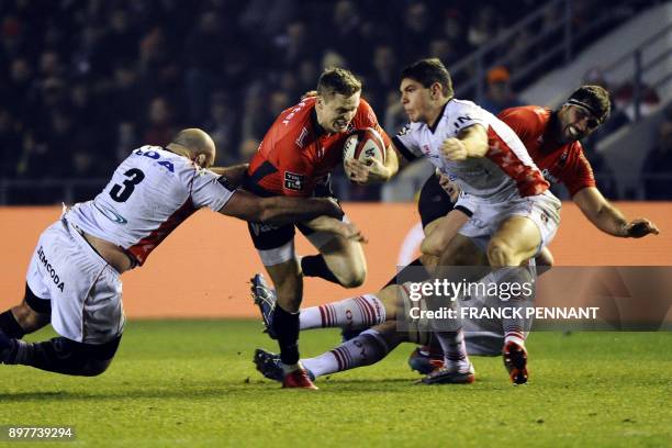 Toulon's English winger Chris Ashton runs with the ball during the French Top 14 rugby union match between Toulon and Oyonnax on December 23 at the...