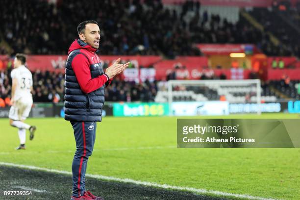 Swansea caretaker manager Leon Britton gives instructions to his players during the Premier League match between Swansea City and Crystal Palace at...