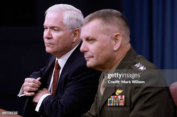 Secretary of Defense Robert M. Gates and Vice Chairman, Joint Chiefs of Staff Gen. James Cartwright participate in a briefing at the Pentagon on...