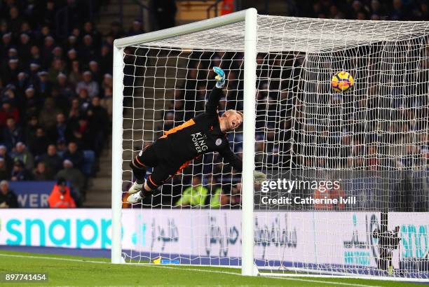 Kasper Schmeichel of Leicester City fails to stop a free kick from Juan Mata of Manchester United during the Premier League match between Leicester...