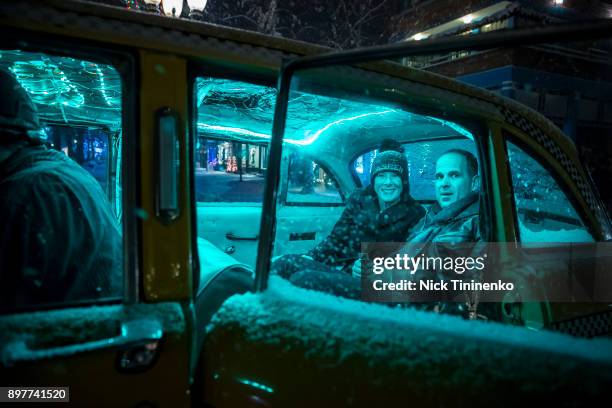 Bobbi and Marcus Lemonis take a ride in The Ultimate Taxi at Aspen Shines Hope: Marcus x Runway on December 21, 2017 in Aspen, Colorado.