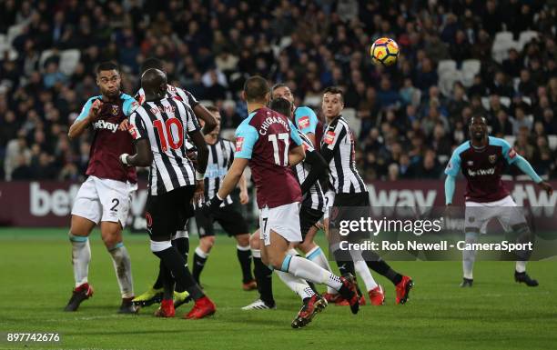 West Ham United's Winston Reid flicks the ball on in the penalty area during the Premier League match between West Ham United and Newcastle United at...