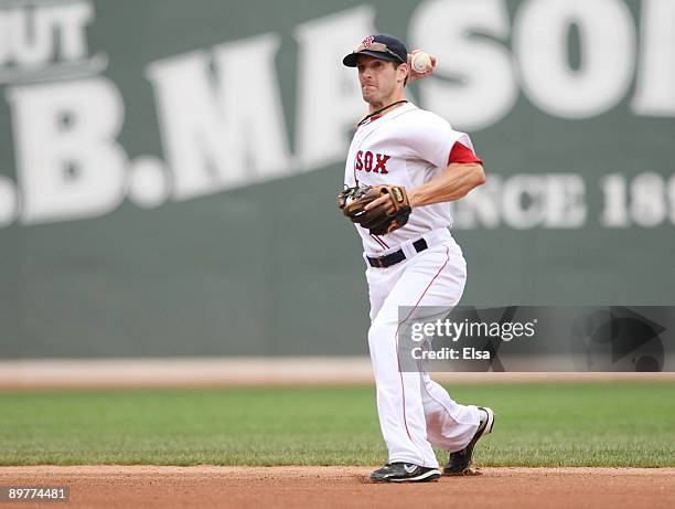 Nick Green of the Boston Red Sox throws to first for the out in the sixth inning during the game against the Detroit Tigers at Fenway Park on August...