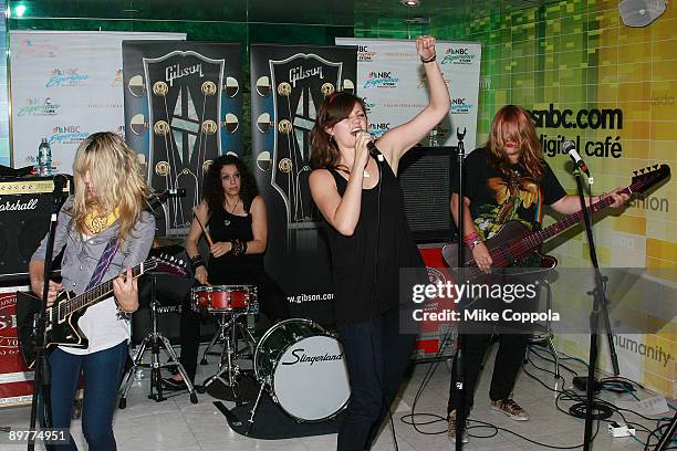 Allison Robertson, Amy Cesari, Brett Anderson, Maya Ford of The Donnas performs at the NBC Experience Store as part of the Gibson Sessions on August...