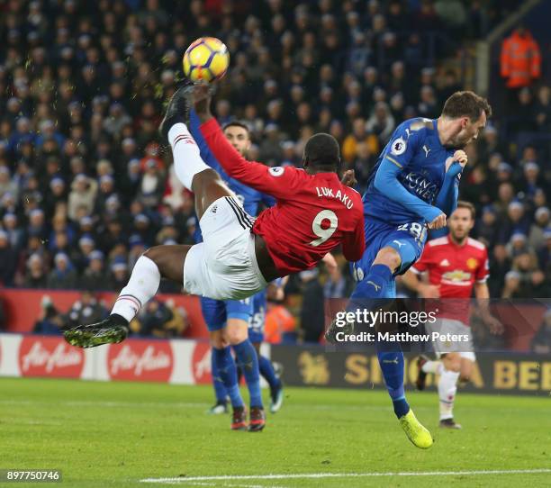 Romelu Lukaku of Manchester United in action with Christian Fuchs of Leicester City during the Premier League match between Leicester City and...