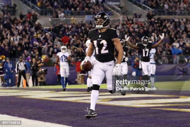 Wide Receiver Michael Campanaro of the Baltimore Ravens scores a touchdown in the second quarter against the Indianapolis Colts at M&T Bank Stadium...