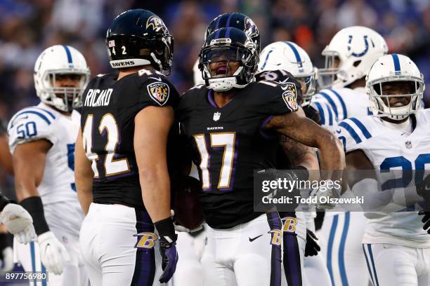 Wide Receiver Mike Wallace of the Baltimore Ravens reacts after a play in the first quarter against the Indianapolis Colts at M&T Bank Stadium on...