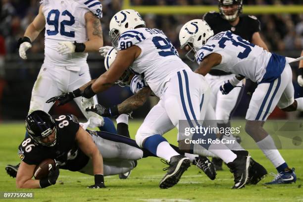 Tight End Nick Boyle of the Baltimore Ravens is tackled after a catch in the second quarter against the Indianapolis Colts at M&T Bank Stadium on...