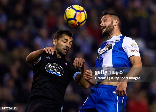 Florin Andone of Deportivo de La Coruna competes for the ball with Jonathan Castro of Celta de Vigo during the La Liga match between Deportivo de La...