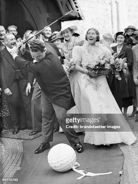 Wedding among golfers. W.J. Cox, a professional golf player marries his scholar Vera Cocking. Photograph. 4th of September 1937. Shirley Parish...