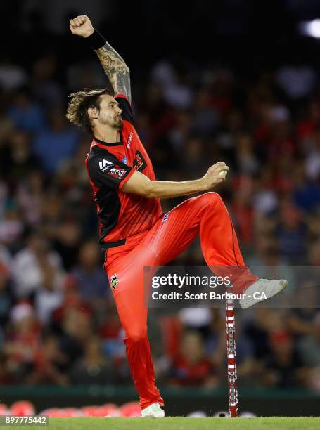 Kane Richardson of the Renegades bowls during the Big Bash League match between the Melbourne Renegades and the Brisbane Heat at Etihad Stadium on...