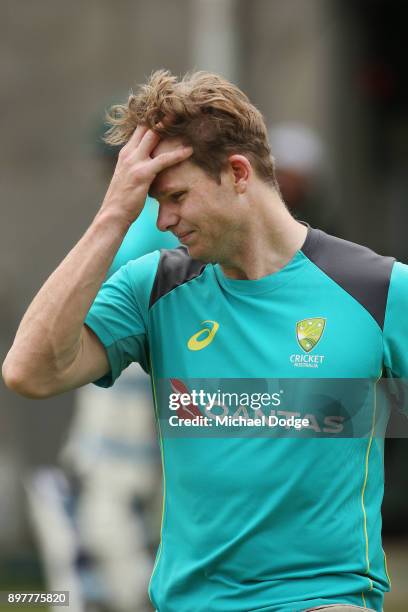 Steve Smith of Australia looks in discomfort after copping a freakish knock to his wrist while sitting in the nets after Cameron Bancroft the ball...