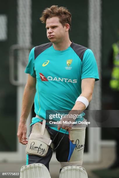Steve Smith of Australia looks in discomfort after copping a freakish knock to his wrist while sitting in the nets after Cameron Bancroft the ball...