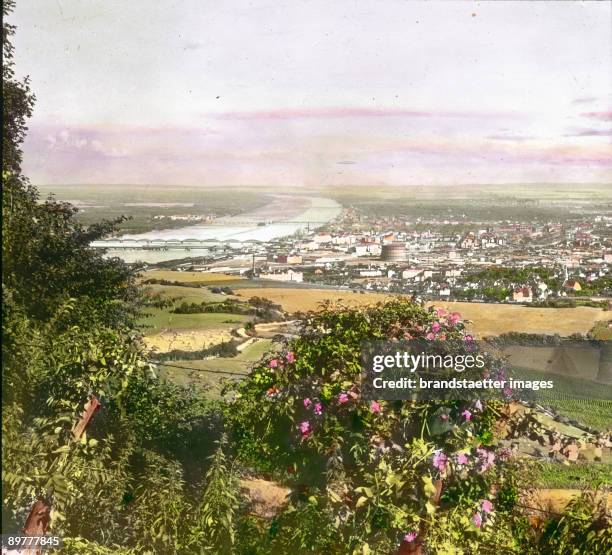 View from the Kahlenberg over Vienna and the Danube river. Hand-colored lantern slide. Around 1910