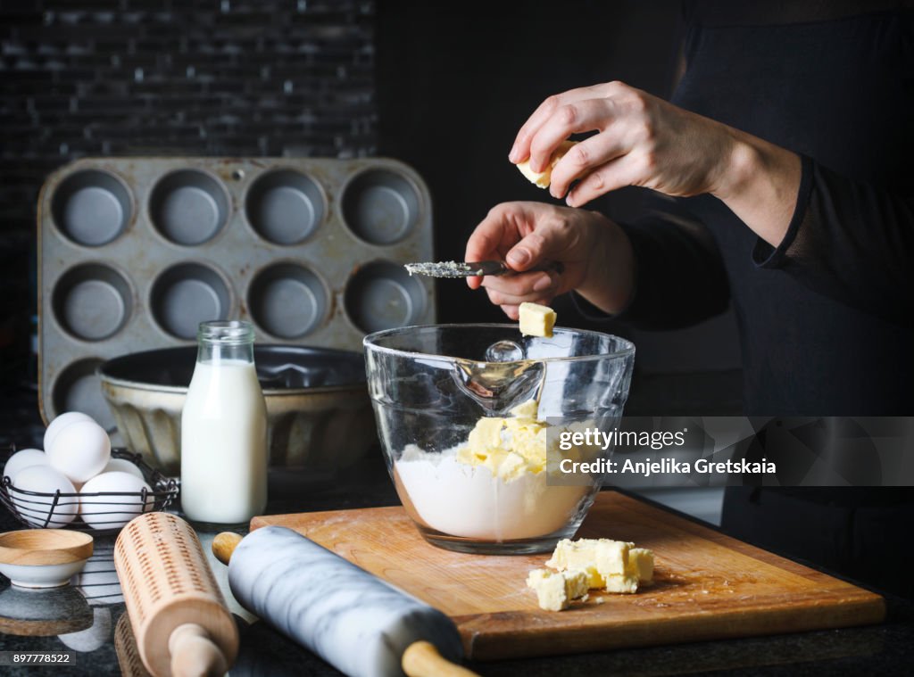 Woman making a flaky pastry dough