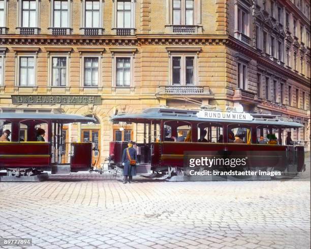 The parlour car "Around Vienna" was cruising the Ringstrasse. Vienna. Hand-colored lantern slide. Around 1910.