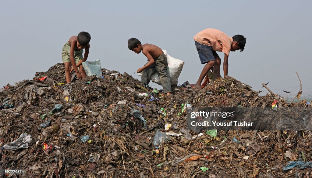 Children collect rubbish for resale. At the end of the day,...