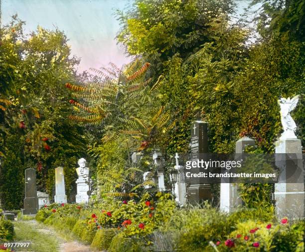 Graves of the Christian, interdenominational section in the Viennese central cemetery. Vienna, 11th district. Hand-colored lantern slide. Around 1910.