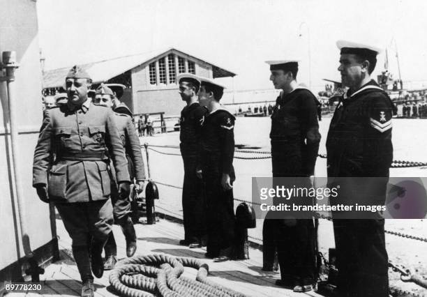 General Franco examining the crew of a war-ship after the conquest of port Vinaròs in the province of Castellón. Vinaròs. Spain. Photograph. June 8,...
