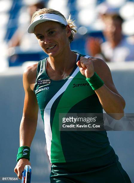 Sybille Bammer of Austria reacts after defeating Serena Williams during Day 4 of the Western & Southern Financial Group Women's Open on August 13,...