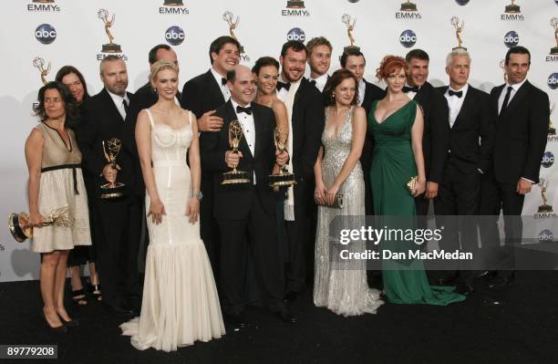 Producer/writer Matthew Weiner with the Emmy for Best Drama Series for 'Mad Men' and cast pose in the press room during the 60th Primetime Emmy...