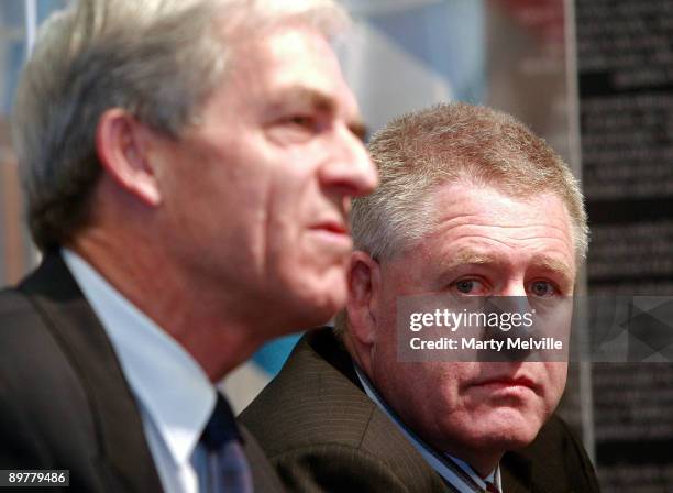 Secretary General of the New Zealand Olympic Committee Barry Maister speaks to the media watched by CEO of the New Zealand Rugby Union Steve Tew...