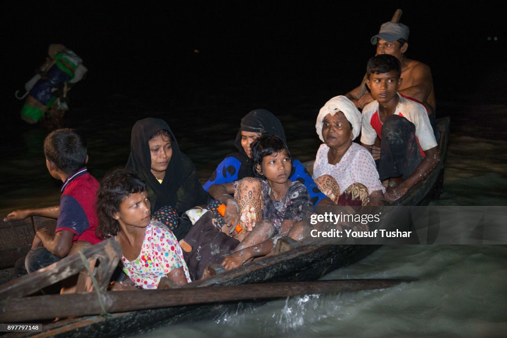 Boats full of people continue to arrive along the shores of...