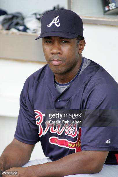 Garret Anderson of the Atlanta Braves sits in the dugout before the game against the San Diego Padres at Petco Park on August 4, 2009 in San Diego,...