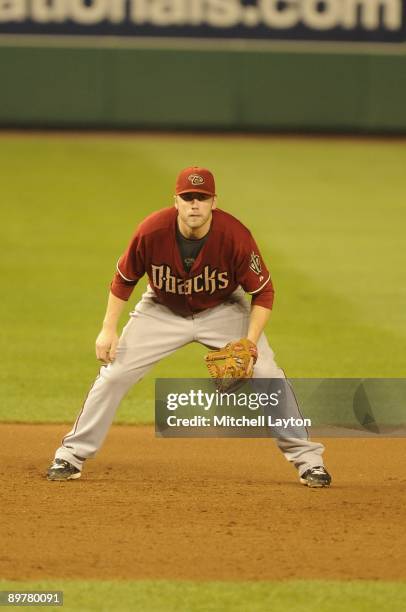 Mark Reynolds of the Arizona Diamondbacks prepares to field a ground ball during a baseball game against the Washington Nationals on August 8, 2009...