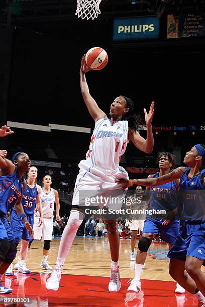 Chamique Holdsclaw of the Atlanta Dream grabs a rebound against the Detroit Shock at Philips Arena August 13, 2009 in Atlanta, Georgia. NOTE TO USER:...