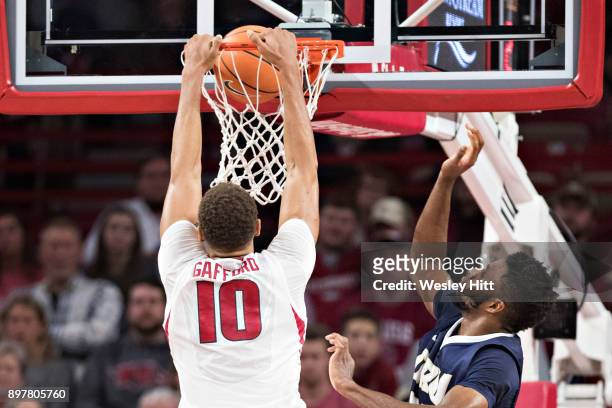 Daniel Gafford of the Arkansas Razorbacks dunks the basketball during a game against the Oral Roberts Golden Eagles at Bud Walton Arena on December...