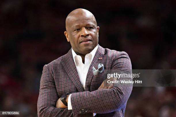 Head Coach Mike Anderson of the Arkansas Razorbacks on the bench during a game against the Oral Roberts Golden Eagles at Bud Walton Arena on December...